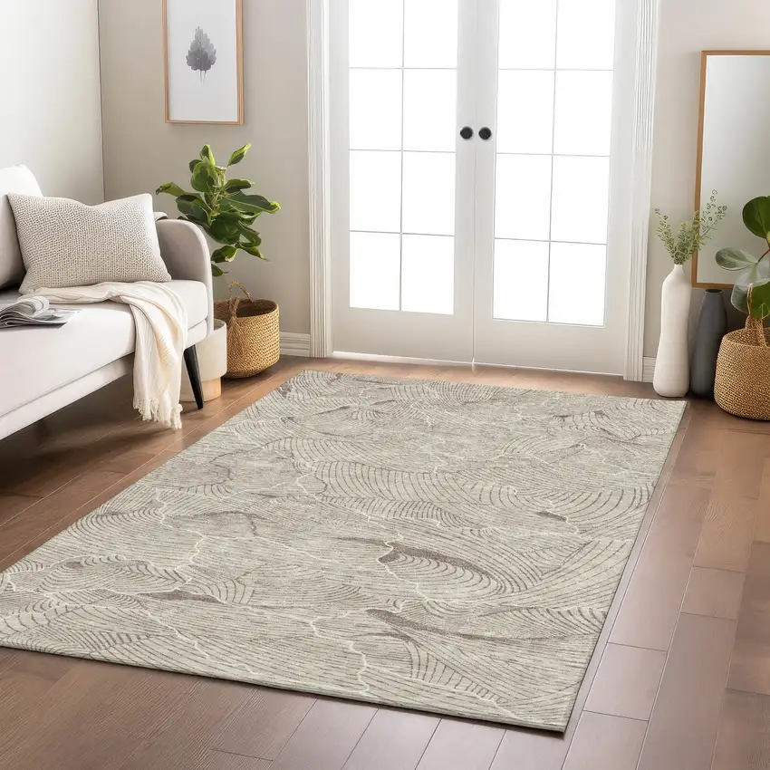 Beige And Tan Abstract Washable Indoor Outdoor Area Rug Photo 9