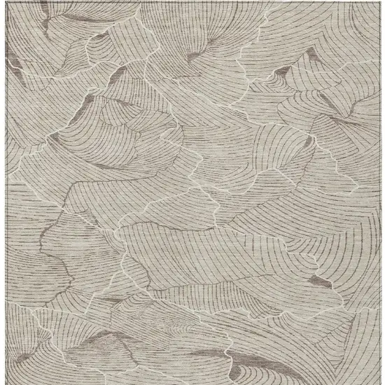 Beige And Tan Abstract Washable Indoor Outdoor Area Rug Photo 6