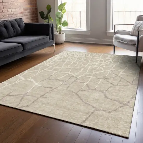 Beige And Tan Abstract Washable Indoor Outdoor Area Rug Photo 8