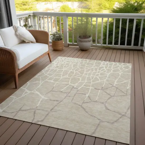 Beige And Tan Abstract Washable Indoor Outdoor Area Rug Photo 7