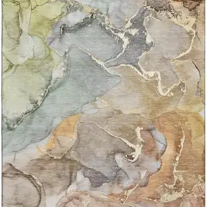 Photo of Beige And Taupe Abstract Washable Area Rug With UV Protection
