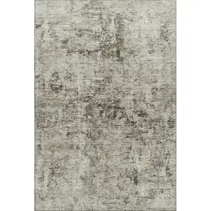 Photo of Beige And Taupe Abstract Washable Area Rug With UV Protection