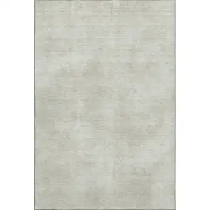 Photo of Beige And Taupe Abstract Washable Area Rug With UV Protection