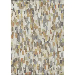 Photo of Beige And Taupe Abstract Washable Indoor Outdoor Area Rug