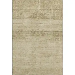 Photo of Beige And Taupe Oriental Washable Area Rug With UV Protection