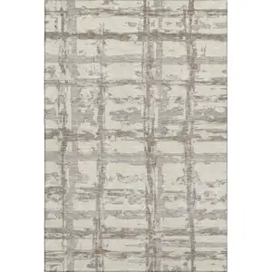 Photo of Beige And Taupe Striped Washable Area Rug With UV Protection