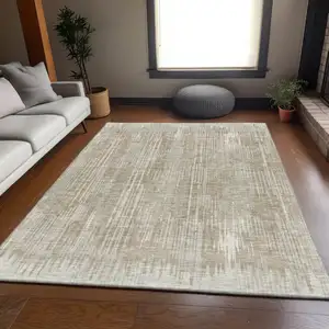 Photo of Beige And Taupe Striped Washable Area Rug With UV Protection