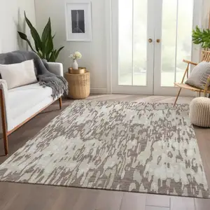 Photo of Beige And Taupe Striped Washable Area Rug With UV Protection