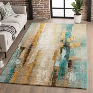 Photo of Beige And Teal Abstract Washable Area Rug With UV Protection