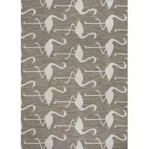 Photo of Beige And White Animal Print Indoor Outdoor Area Rug