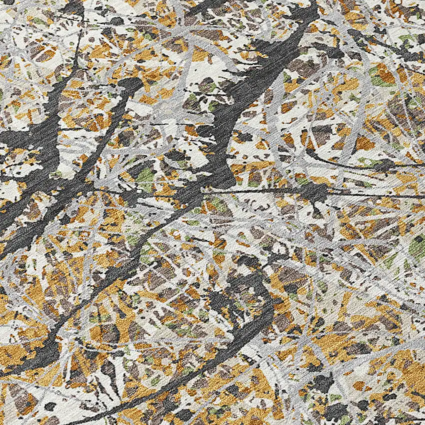 Beige Black And Ivory Abstract Washable Indoor Outdoor Area Rug Photo 1