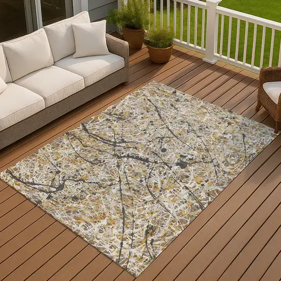 Beige Black And Ivory Abstract Washable Indoor Outdoor Area Rug Photo 3