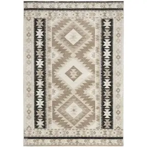 Photo of Beige Black And Tan Geometric Flatweave Area Rug