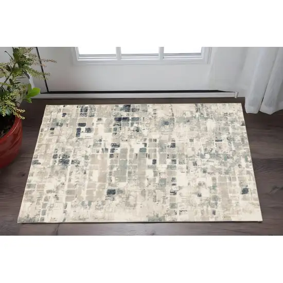 Blue and Beige Abstract Area Rug Photo 1