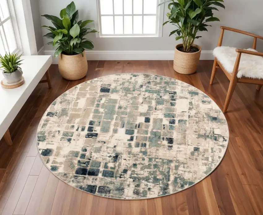8' Blue and Beige Round Abstract Area Rug Photo 1