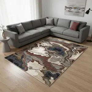 Photo of Beige Blue And Black Abstract Area Rug