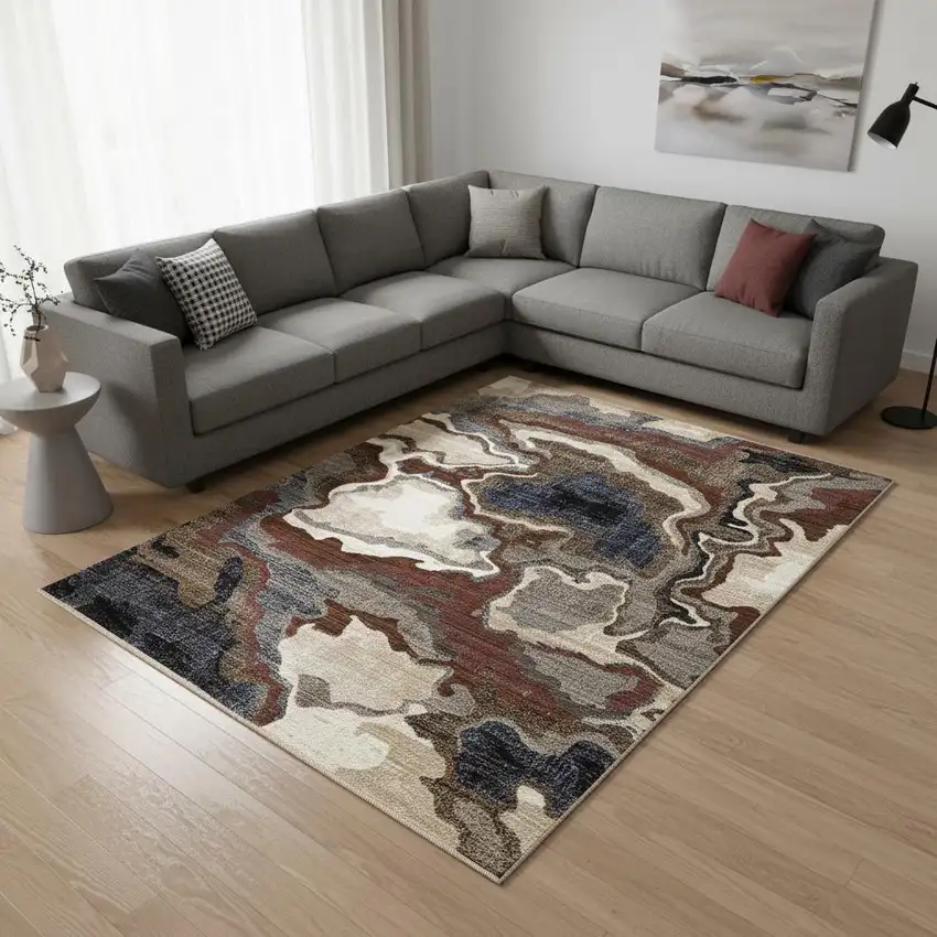 Beige Blue And Black Abstract Area Rug Photo 1