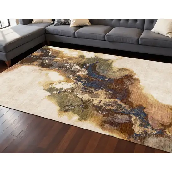 Beige Blue And Brown Abstract Area Rug Photo 1