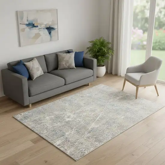 Beige Blue And Brown Abstract Area Rug Photo 1