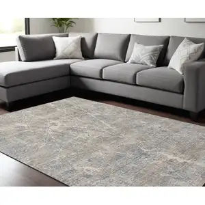 Photo of Beige Blue And Brown Abstract Area Rug