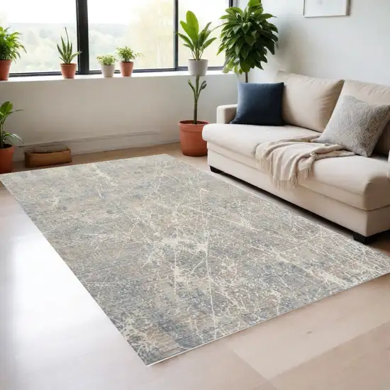 Beige Blue And Brown Abstract Area Rug Photo 1