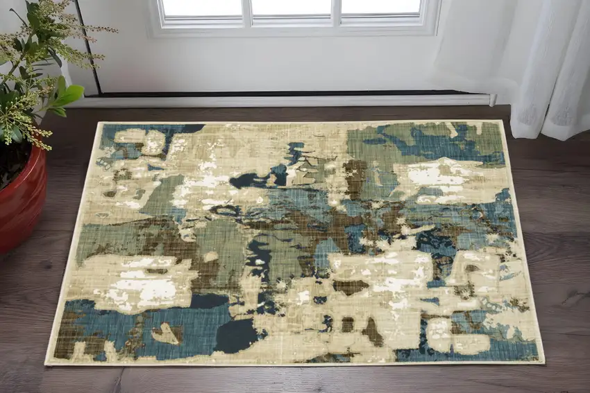 Beige Blue And Brown Abstract Area Rug Photo 1