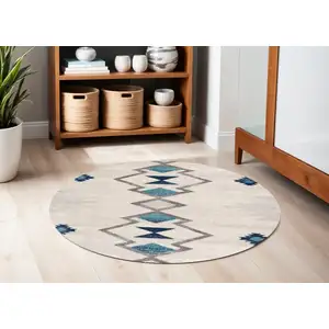 Photo of Beige Blue And Brown Abstract Round Rug
