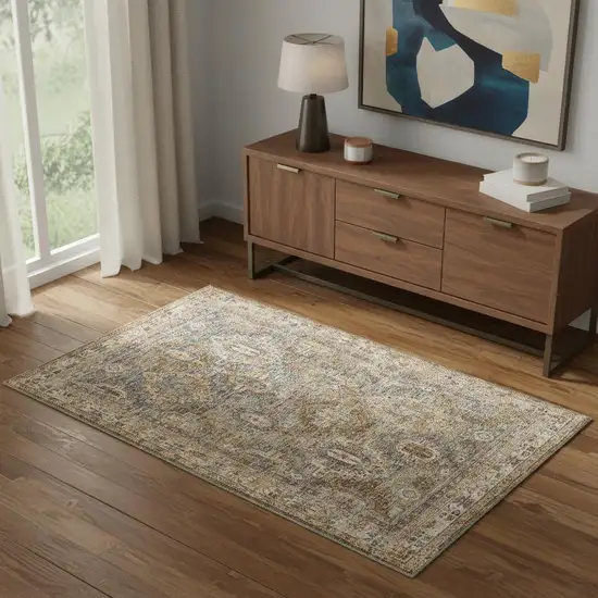 Beige Blue And Brown Geometric Distressed Area Rug Photo 1