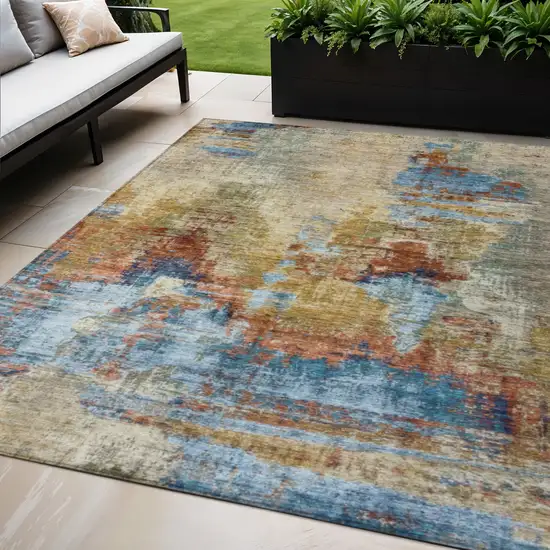 Beige Blue And Gold Abstract Washable Indoor Outdoor Area Rug Photo 1