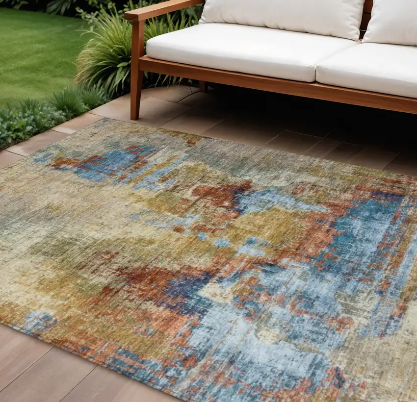 Beige Blue And Gold Abstract Washable Indoor Outdoor Area Rug Photo 1