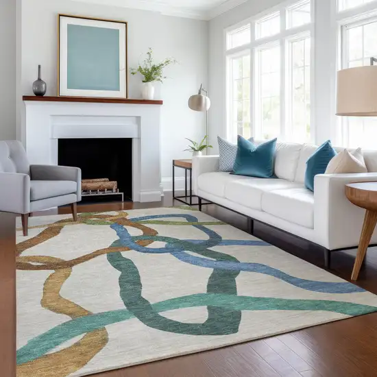 Beige Blue And Green Abstract Washable Indoor Outdoor Area Rug Photo 6