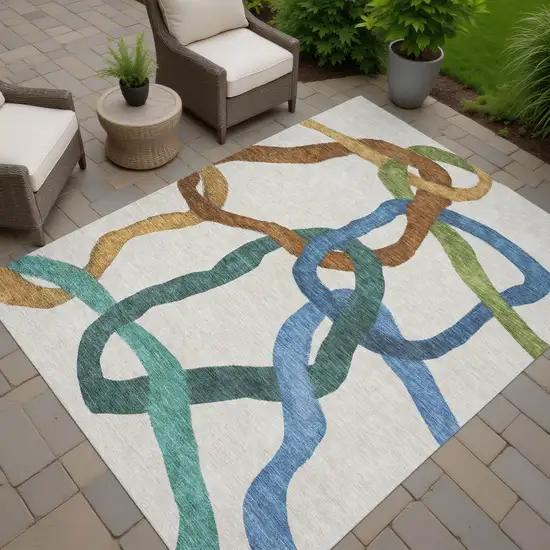 Beige Blue And Green Abstract Washable Indoor Outdoor Area Rug Photo 7