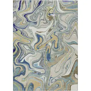 Photo of Beige Blue And Ivory Abstract Washable Indoor Outdoor Area Rug