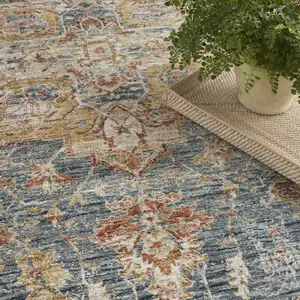 Photo of Beige Blue And Ivory Oriental Distressed Area Rug