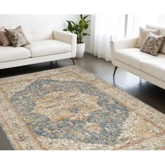 Beige Blue And Ivory Oriental Distressed Area Rug Photo 1