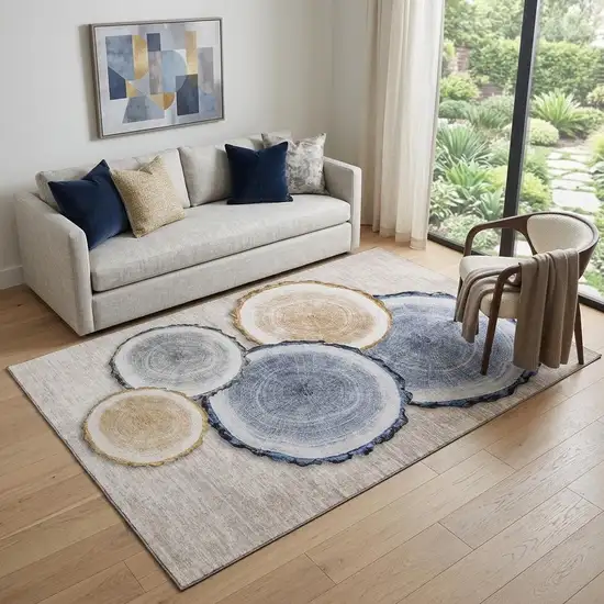 Beige Blue And Ivory Faux Bois Washable Area Rug With UV Protection Photo 1