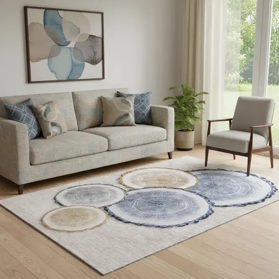 Beige Blue And Ivory Woodland Lodge Washable Area Rug With UV Protection Photo 1
