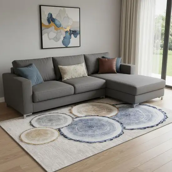 Beige Blue And Ivory Woodland Lodge Washable Area Rug With UV Protection Photo 1