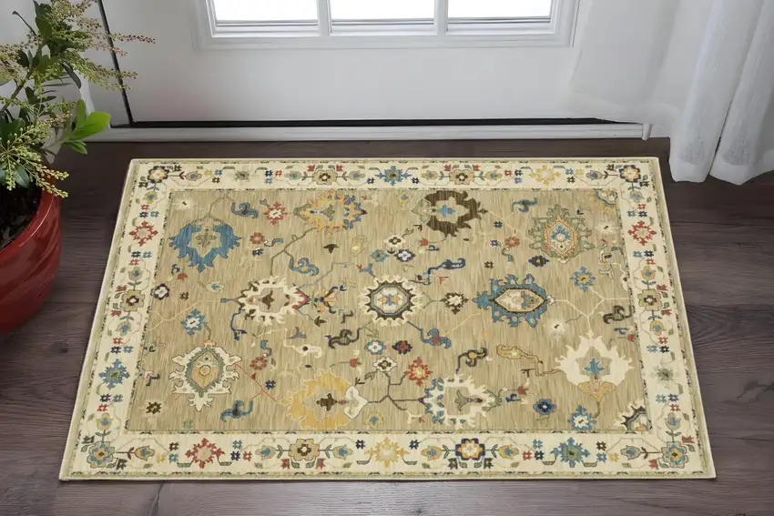 Beige Blue And Red Oriental Area Rug With Fringe Photo 1