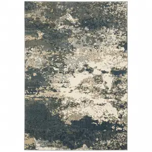 Photo of Beige Blue And Sage Abstract Power Loom Stain Resistant Area Rug