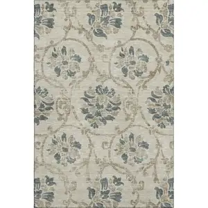 Photo of Beige Blue And Tan Floral Washable Area Rug With UV Protection