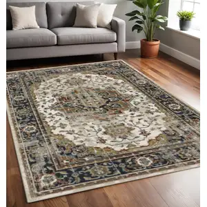 Photo of Beige Blue Green Rust And Grey Oriental Power Loom Stain Resistant Area Rug