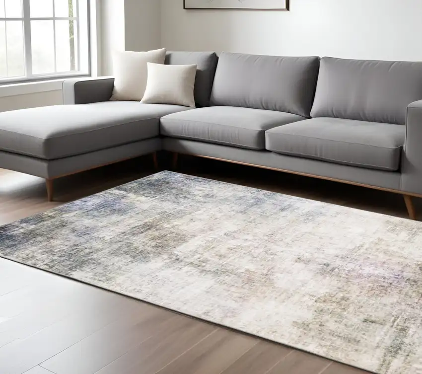 Blue And Beige Abstract Distressed Area Rug Photo 1