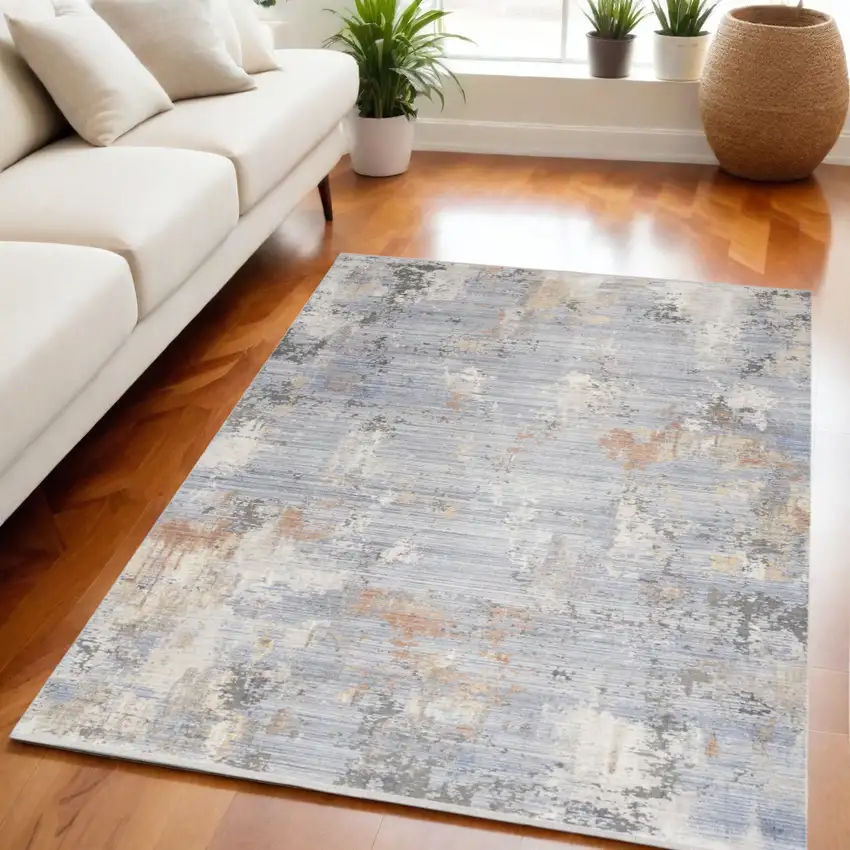 Beige Blue and Gray Abstract Area Rug With Fringe Photo 1