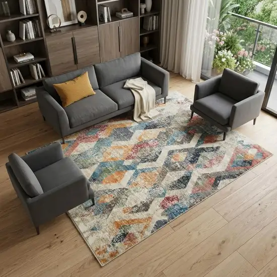Beige Blue and Gray Geometric Distressed Area Rug With Fringe Photo 1