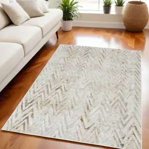 Photo of Beige Blue and Ivory Chevron Distressed Non Skid Area Rug
