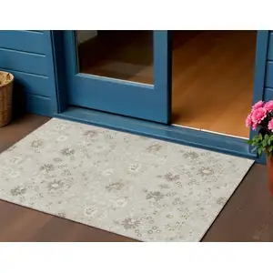 Photo of Beige Brown And Green Oriental Washable Indoor Outdoor Area Rug
