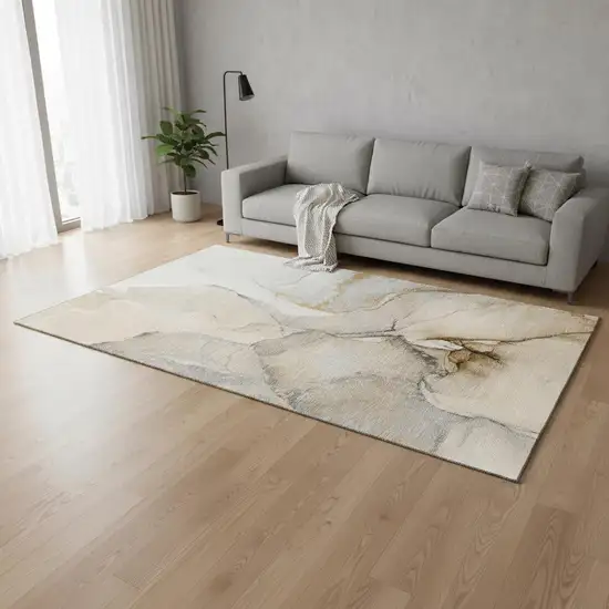 Beige Brown And Ivory Abstract Washable Area Rug With UV Protection Photo 1