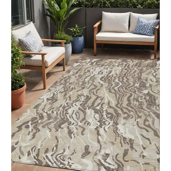 Beige Brown And Ivory Abstract Washable Indoor Outdoor Area Rug Photo 1