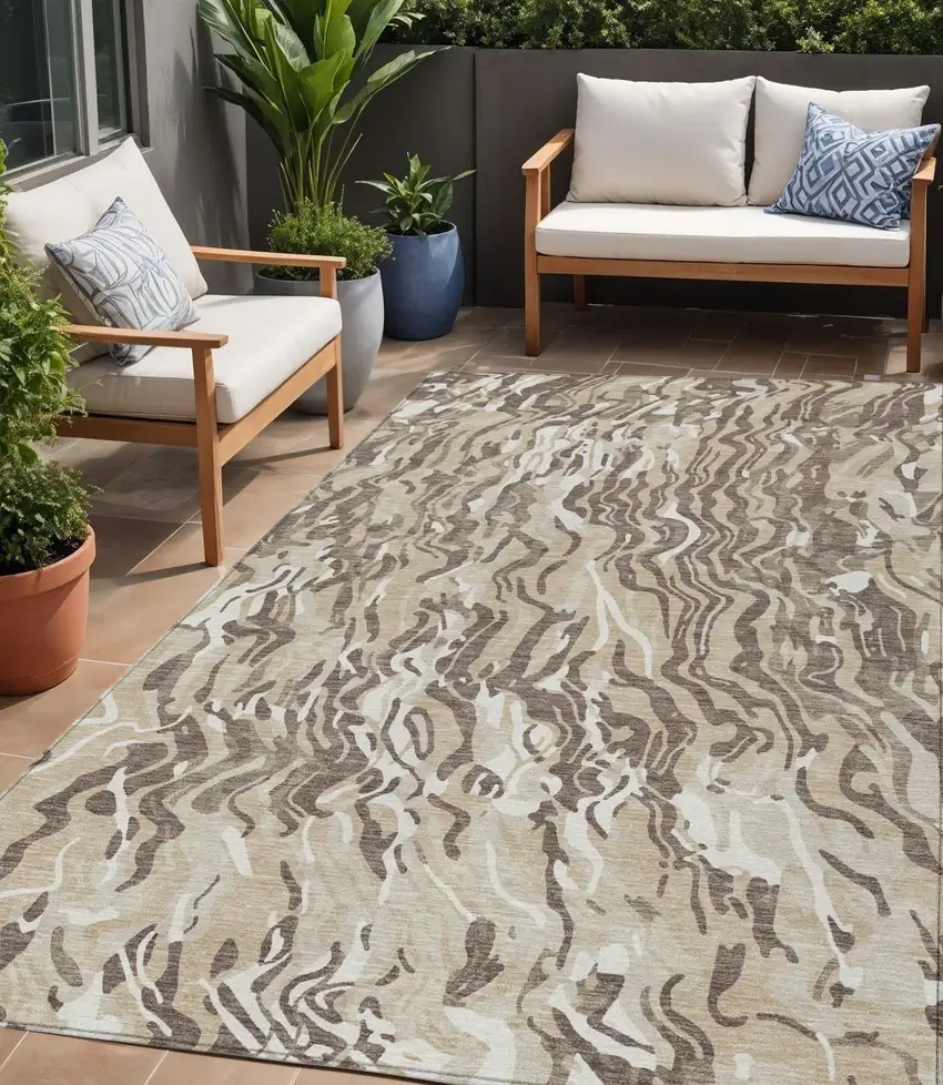 Beige Brown And Ivory Abstract Washable Indoor Outdoor Area Rug Photo 1
